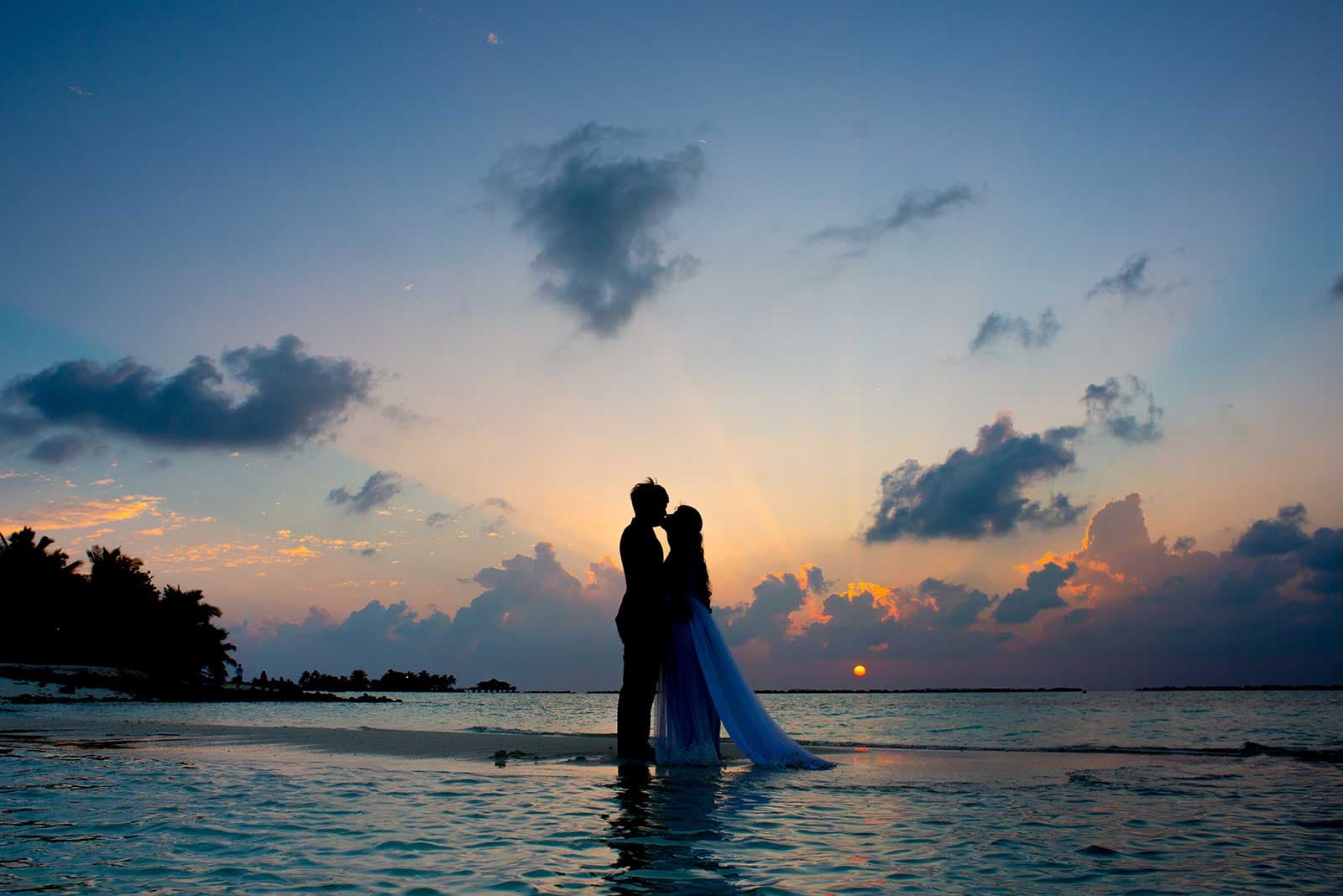 A cinematic MG1 Studio wedding portrait at sunset